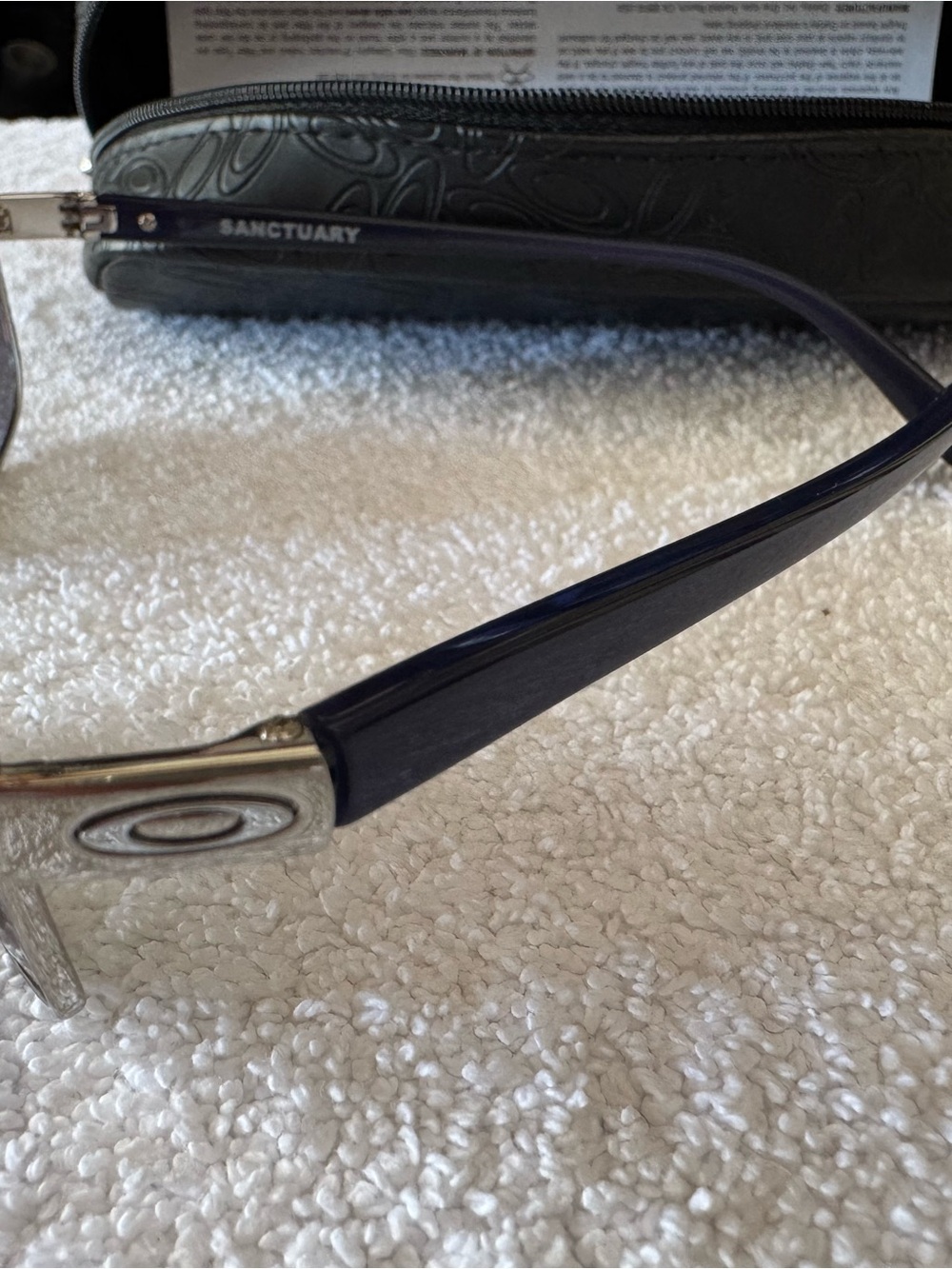 Oakley  Sanctuary Navy Blue Sunglasses with Silver Accents